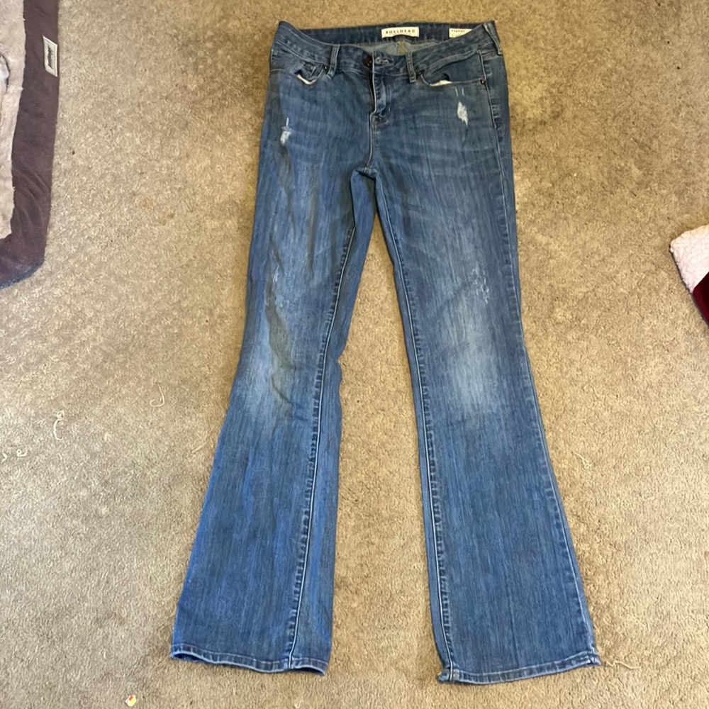 Two pair Bull head boot, cut, lightly distressed jeans.